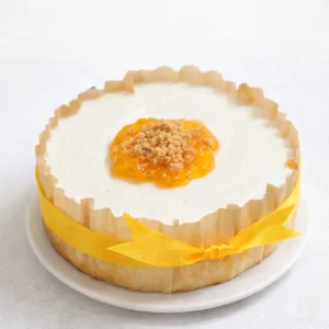 Tarta de queso con mermelada de melocotón